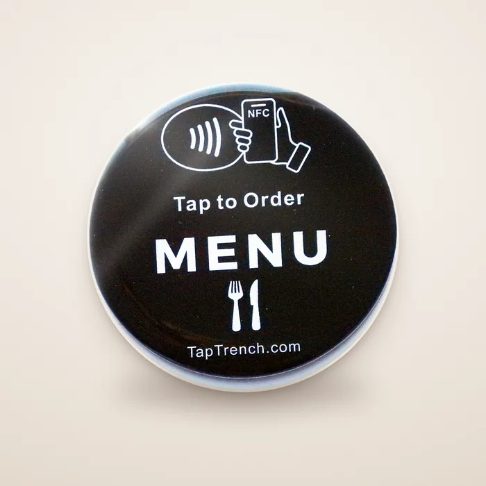 Round Tap-to-Order Menu Plate on a studio background