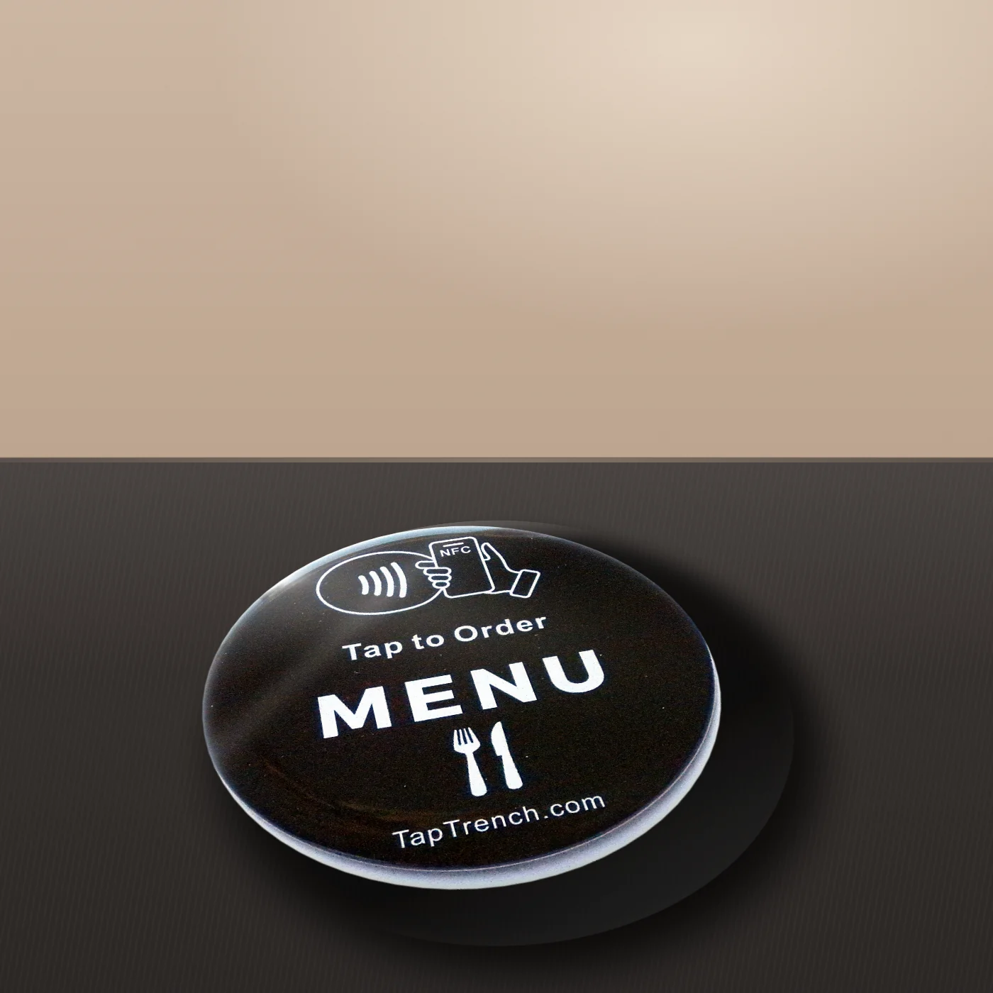 Round menu tap plate on a café counter