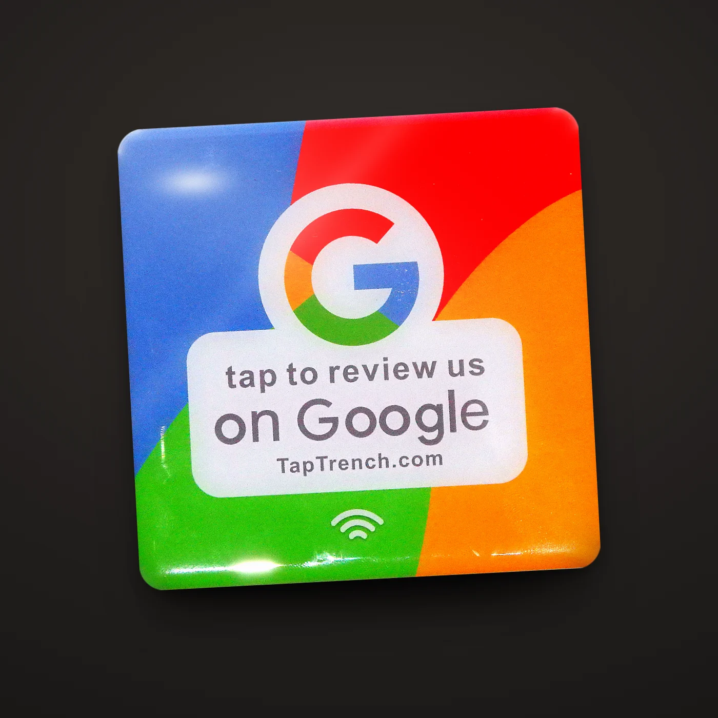 Google Review Tap Plate close-up on a dark background